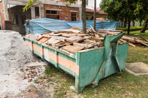 Residents disposing of household waste in Seven Sisters